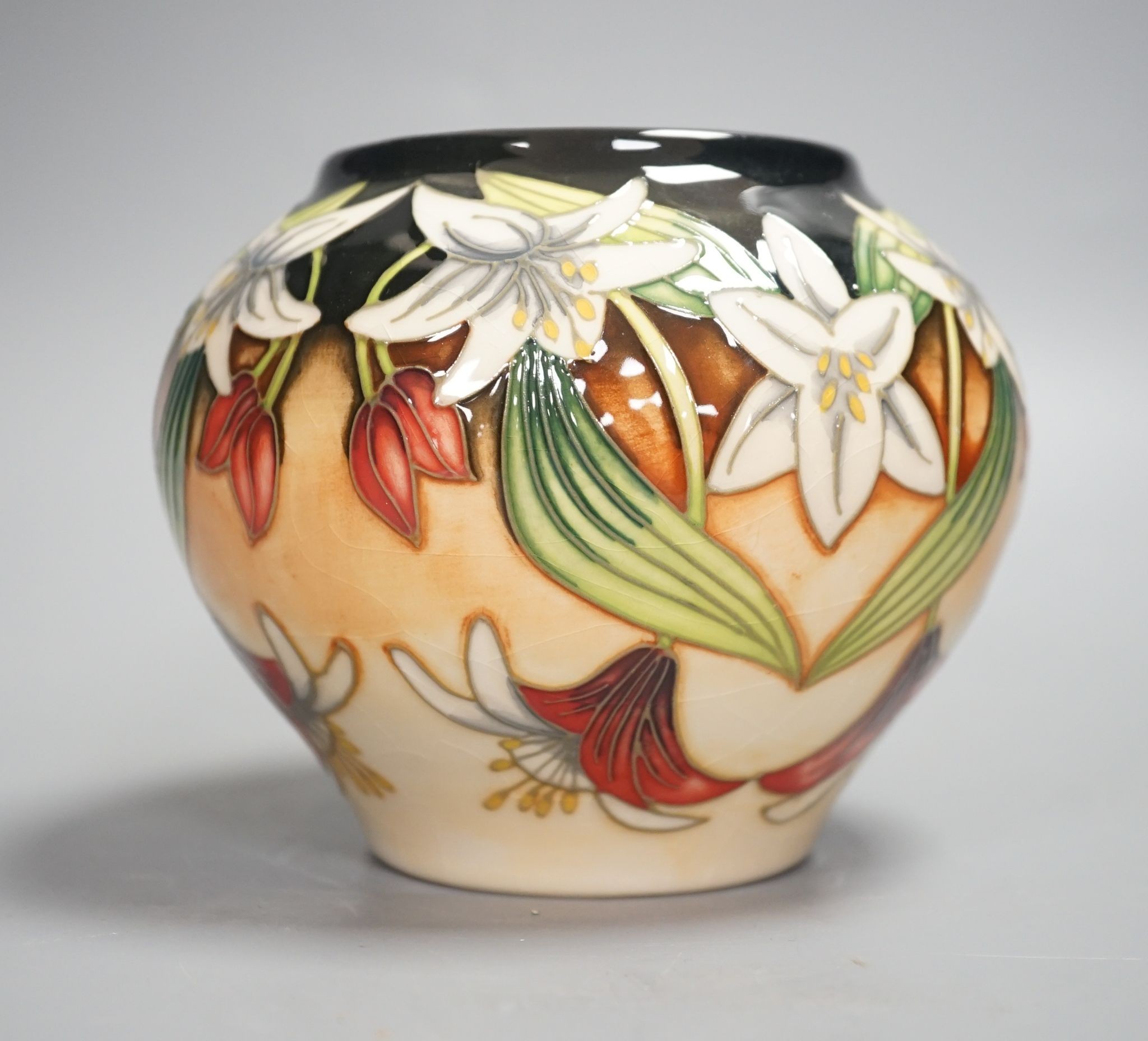 A Moorcroft squat limited edition vase signed Angi Davenport, 11 cms high.